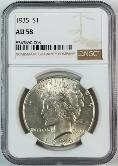1935 Peace Dollar NGC Certified AU-58 Silver Coin: 1935 Peace Dollar NGC Certified AU-58 Silver Coin This 1935 Peace Dollar features a stunning design and is an excellent example of American coinage. Certified by NGC with an AU-58 grade, it showcases
