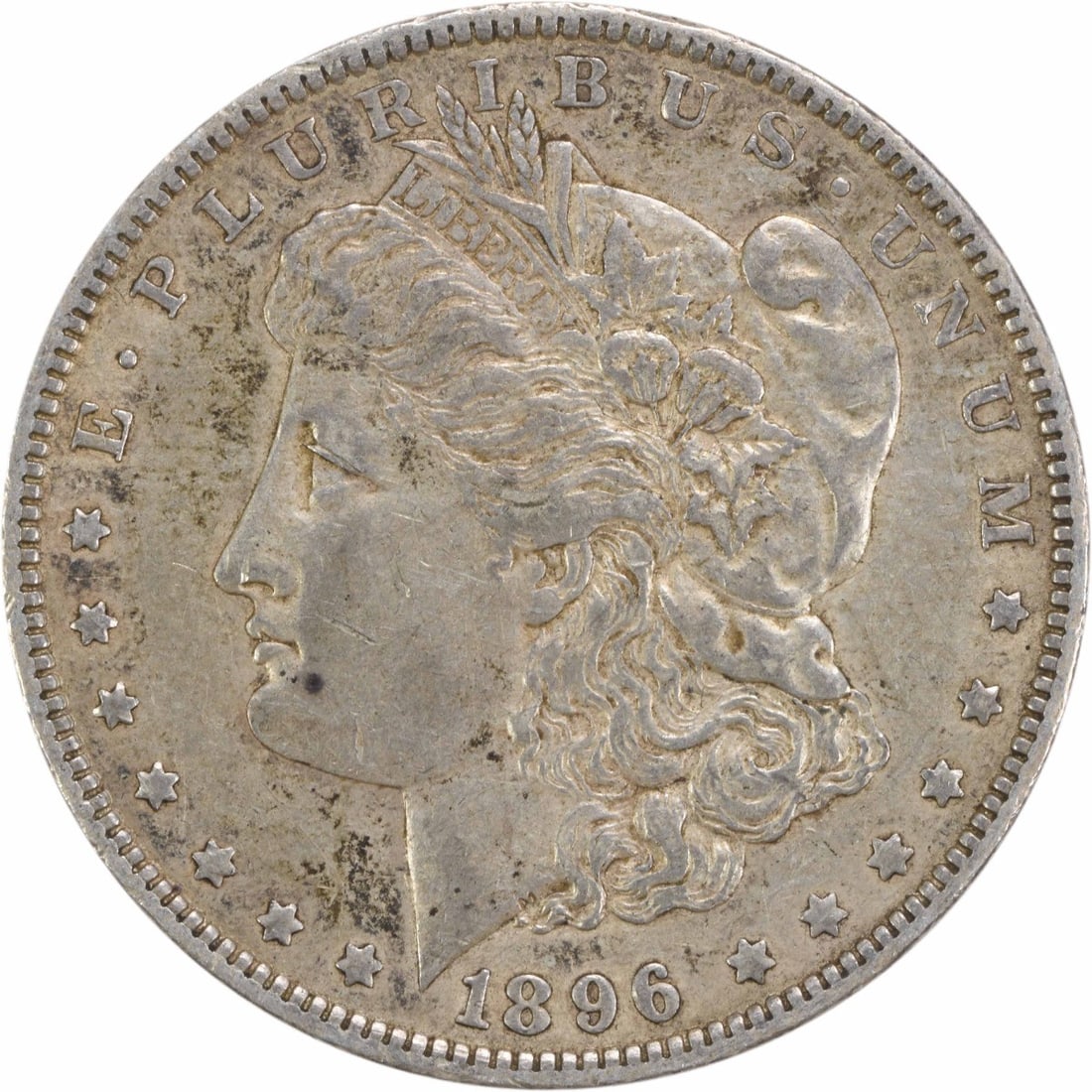 1896-O Morgan Silver Dollar EF Uncertified 90% Silver Coin: 1896-O Morgan Silver Dollar EF Uncertified 90% Silver Coin This 1896-O Morgan Silver Dollar is a beautiful representation of American coinage, featuring the iconic design by George T. Morgan. The coin