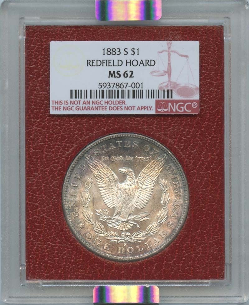 1883-S Morgan Dollar NGC MS62 Redfield Hoard Certified Coin: 1883-S Morgan Dollar NGC MS62 Redfield Hoard Certified Coin This 1883-S Morgan Dollar is a stunning example from the Redfield Hoard, graded MS62 by NGC, ensuring its remarkable uncirculated condition.
