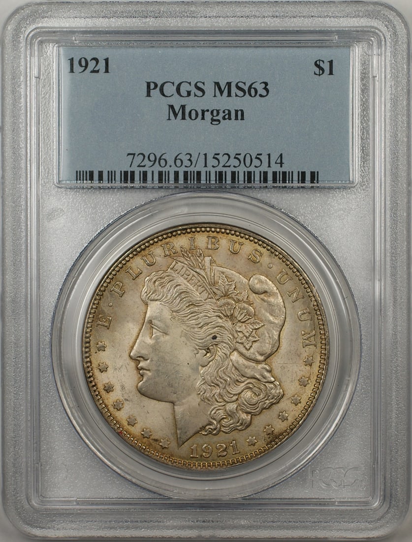 1921 Morgan Silver Dollar Coin PCGS MS63 Uncirculated Light Toning: 1921 Morgan Silver Dollar Coin PCGS MS63 Uncirculated Light Toning This 1921 Morgan Silver Dollar coin, graded MS-63 by PCGS, features light toning and is in uncirculated condition. Minted in Philadel