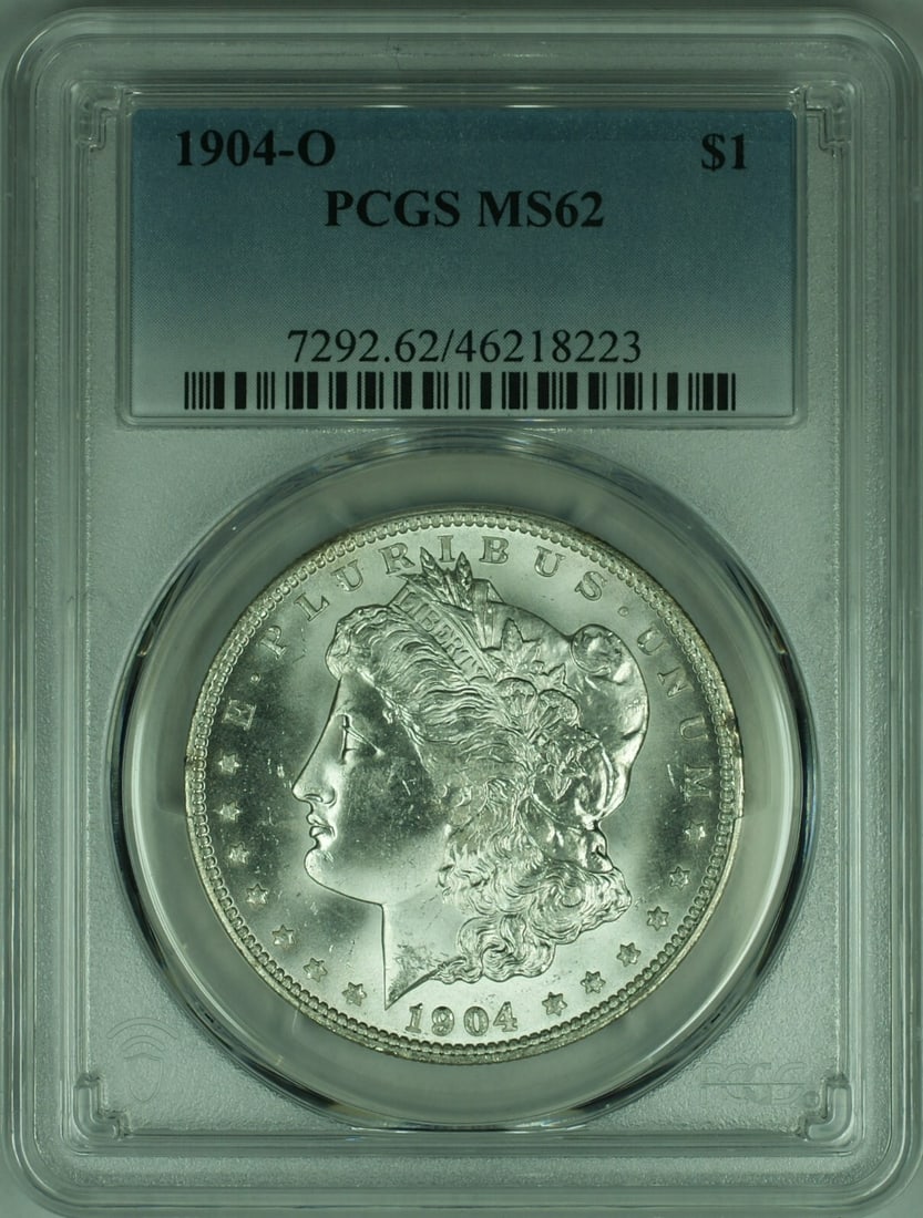 1904-O Morgan Silver Dollar Coin PCGS MS-62 Uncirculated Silver: 1904-O Morgan Silver Dollar Coin PCGS MS-62 Uncirculated Silver This 1904-O Morgan Silver Dollar is a remarkable piece of numismatic history, featuring a stunning uncirculated condition with a grade o