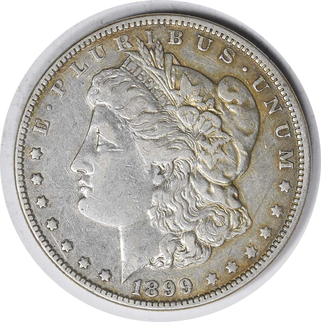 1899 VAM 5 Morgan Silver Dollar Micro O 90% Silver Coin: 1899 VAM 5 Morgan Silver Dollar Micro O 90% Silver Coin This 1899 VAM 5 Morgan Silver Dollar features the distinctive Micro O mint mark and wing lines, making it a notable addition for collectors. Str