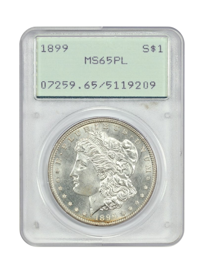 1899 Morgan Dollar PCGS MS65PL OGH Rattler Certified $1 Philadelphia: 1899 Morgan Dollar PCGS MS65PL OGH Rattler Certified $1 Philadelphia This 1899 Morgan Dollar is graded MS65PL by PCGS and is housed in the original green label 'Rattler' holder. Featuring satiny proof
