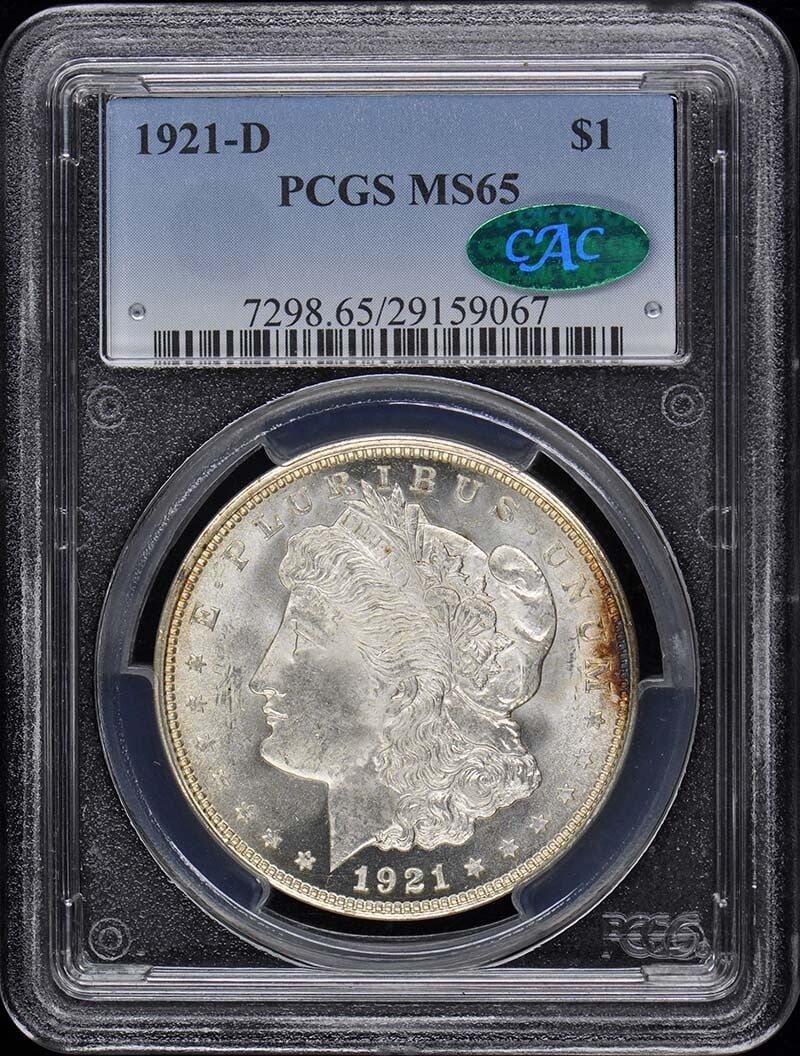 1921-D Morgan Dollar PCGS MS65 CAC Uncirculated Denver Mint: 1921-D Morgan Dollar PCGS MS65 CAC Uncirculated Denver Mint This 1921-D Morgan Dollar is certified by PCGS with a grade of MS65, indicating its uncirculated condition. Minted in Denver, this coin is a