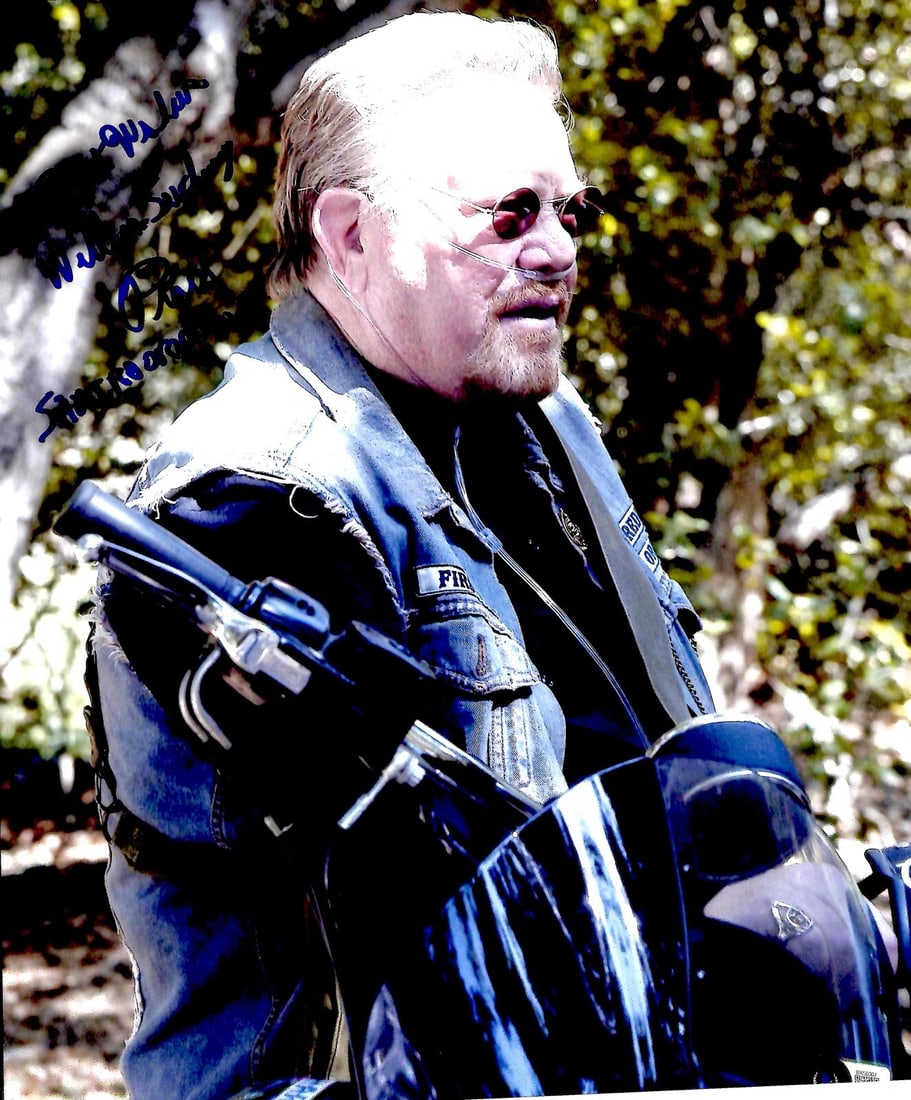 William Lucking Signed 11x14 Sons of Anarchy Photo Beckett Certified: William Lucking Signed 11x14 Sons of Anarchy Photo Beckett Certified This is an autographed 11x14 photograph of William Lucking, renowned for his role as "Piney Winston" in the acclaimed TV series Son