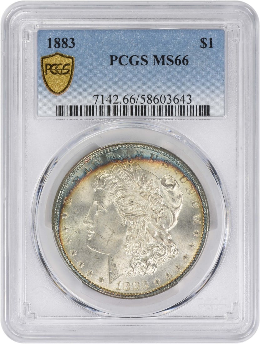 MS66 Graded 1883 Morgan Dollar Certified by PCGS Toned: MS66 Graded 1883 Morgan Dollar Certified by PCGS Toned This 1883 Morgan Silver Dollar is graded MS66 by PCGS and features attractive toning. Struck at the Philadelphia Mint, it is composed of 90% silv