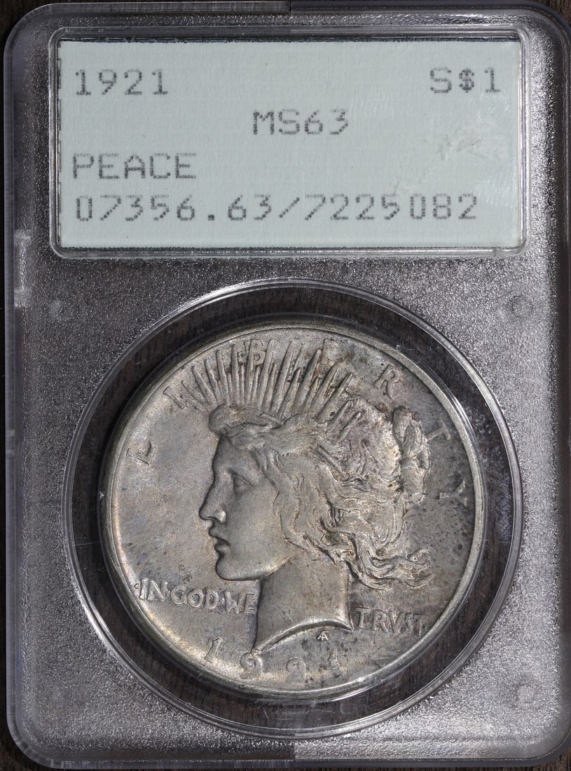 1921 MS63 Peace Silver Dollar PCGS Rattler Uncirculated Beautiful Surfaces: 1921 MS63 Peace Silver Dollar PCGS Rattler Uncirculated Beautiful Surfaces This stunning 1921 High Relief Peace Silver Dollar is graded MS63 by PCGS, showcasing beautiful surfaces that reflect its unc