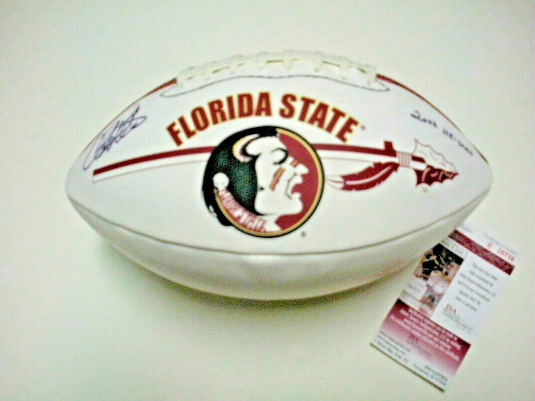 Chris Weinke Signed Football Florida State Seminoles 2000 Heisman JSA COA: Chris Weinke Signed Football Florida State Seminoles 2000 Heisman JSA COA This is a signed football by Chris Weinke, the esteemed quarterback of the Florida State Seminoles, known for winning the Heis