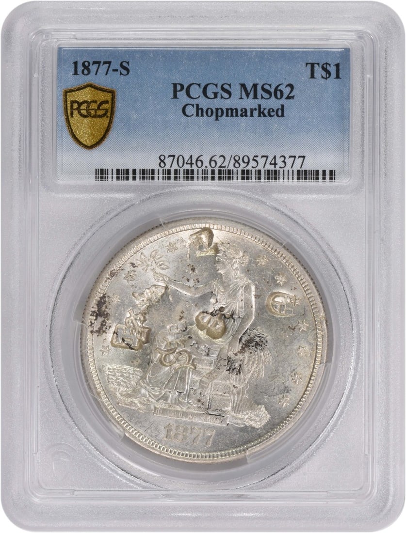 1877-S Trade Silver Dollar PCGS MS62 Chopmarked: 1877-S Trade Silver Dollar PCGS MS62 Chopmarked This 1877-S Trade Silver Dollar is a remarkable piece from the United States, certified by PCGS with a grade of MS62. Struck in Philadelphia, this coin