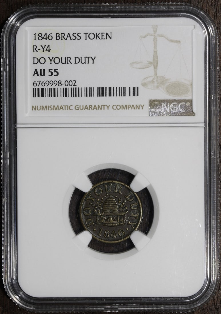 1846 DO YOUR DUTY Brass Token R-Y4 Beehive NGC AU55: 1846 DO YOUR DUTY Brass Token R-Y4 Beehive NGC AU55 This 1846 Do Your Duty Brass Token is a unique collectible that showcases a beehive design, representing its historical significance. It is classifi