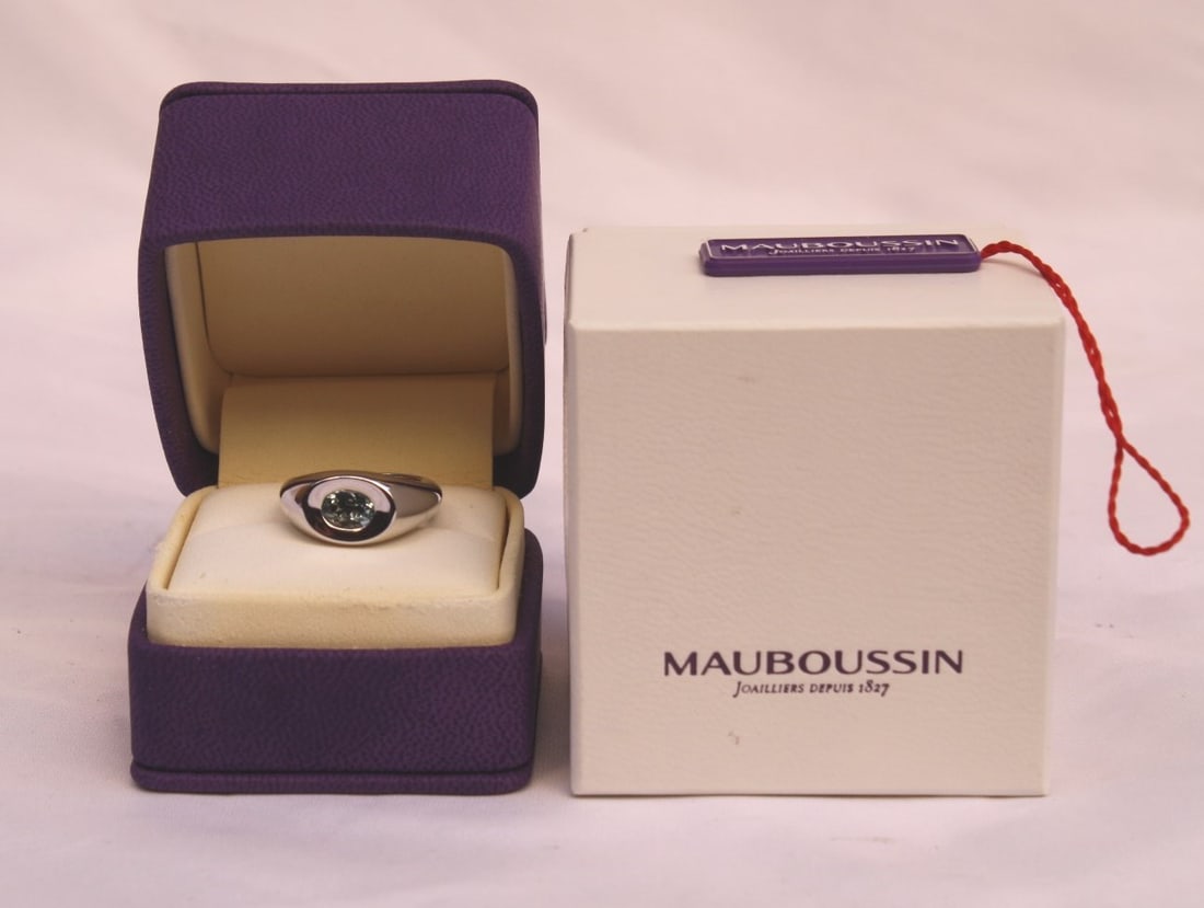 Stunning Mauboussin 18K White Gold Aquamarine Ring 6.75 with Box: Stunning Mauboussin 18K White Gold Aquamarine Ring 6.75 with Box Introducing a stunning Mauboussin 18K white gold ring featuring a beautiful aquamarine stone. This exquisite piece, crafted in France,