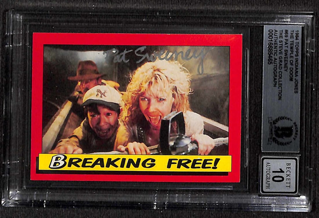 1984 Topps Indiana Jones TOD #68 Signed Card by Pat Sweeney BAS 10: 1984 Topps Indiana Jones TOD #68 Signed Card by Pat Sweeney BAS 10 This is a signed 1984 Topps Indiana Jones Temple of Doom trading card (#68), featuring the iconic scene "Battling Mine Cars!" The car