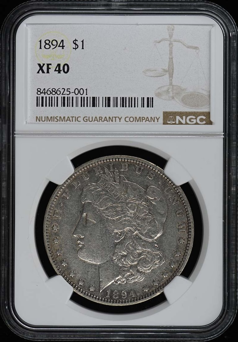 1894 Morgan Dollar S$1 NGC XF40 Certified Coin: 1894 Morgan Dollar S$1 NGC XF40 Certified Coin This 1894 Morgan Dollar, certified by NGC with a grade of XF40, is a notable addition for any coin collector. Minted in Philadelphia, this silver dollar