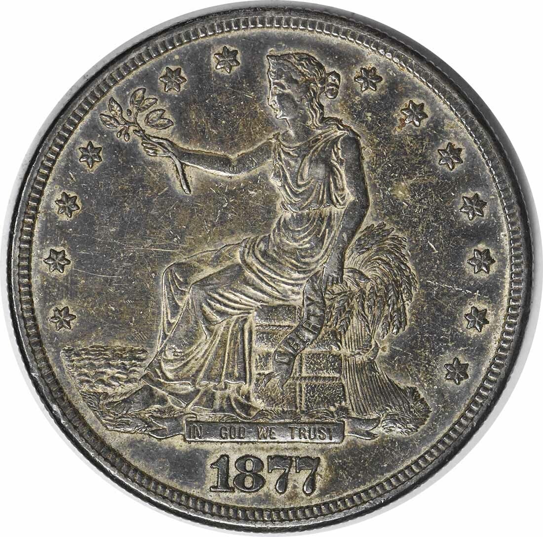 1877-S Trade Silver Dollar AU Uncertified William Barber Design: 1877-S Trade Silver Dollar AU Uncertified William Barber Design This 1877-S Trade Silver Dollar is a remarkable piece of history, showcasing the artistry of designer William Barber. The coin, minted i