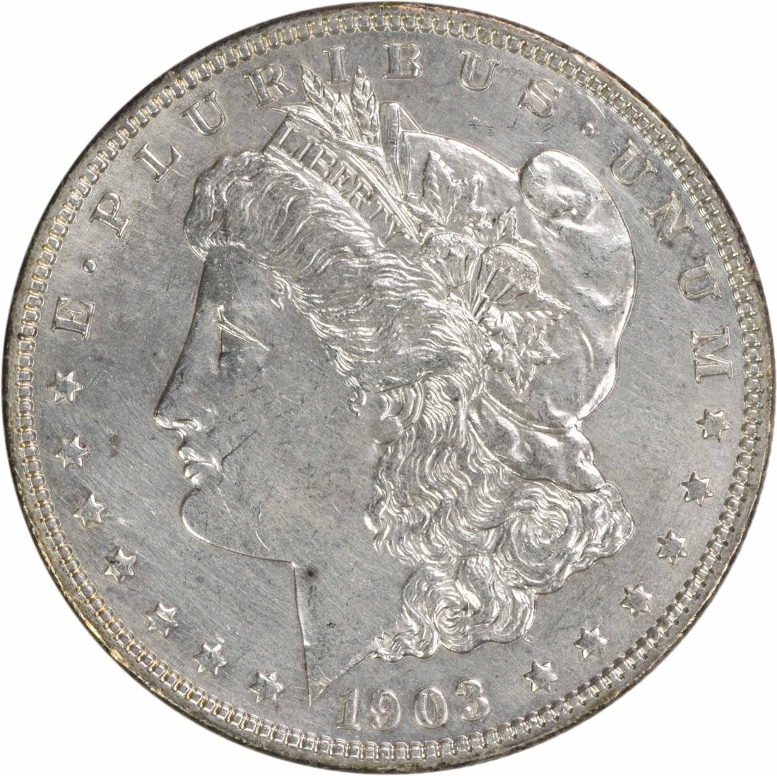 1903 Morgan Silver Dollar AU Uncertified 90% Silver Coin: 1903 Morgan Silver Dollar AU Uncertified 90% Silver Coin This 1903 Morgan Silver Dollar features a classic design by George T. Morgan, showcasing the artistry and historical significance of American c