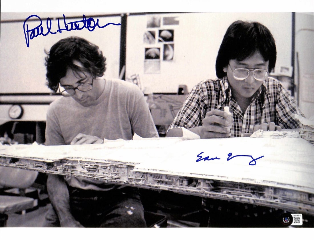 Signed 11x14 Star Wars ROTJ Photo by Ease Owyeung Paul Huston Beckett Authenticated: Signed 11x14 Star Wars ROTJ Photo by Ease Owyeung Paul Huston Beckett Authenticated This is an autographed 11x14 photograph from Star Wars: Return of the Jedi, signed by former ILM model makers Ease O