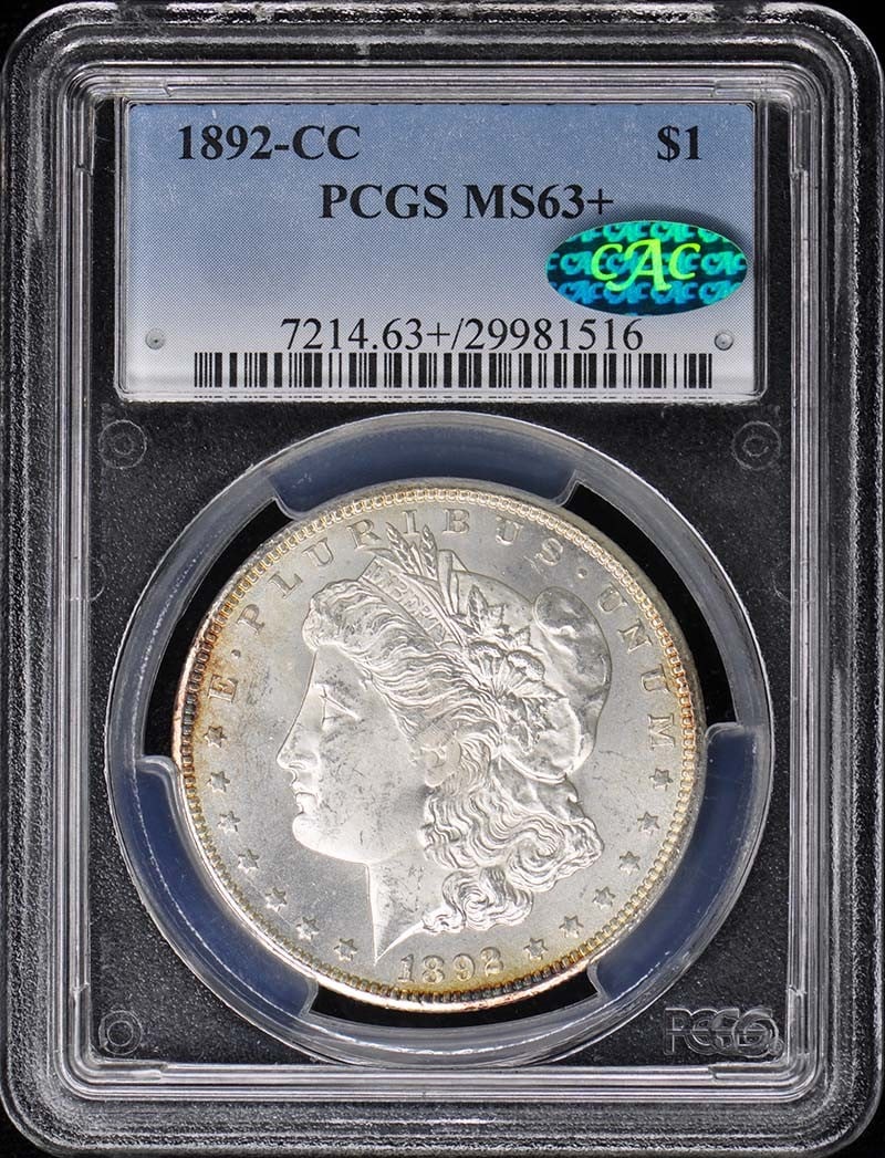 PCGS MS63 Plus CAC 1892 Carson City Morgan Dollar Silver Coin: PCGS MS63 Plus CAC 1892 Carson City Morgan Dollar Silver Coin This is an 1892-CC Morgan Dollar graded MS63+ by PCGS, featuring a CAC designation. Minted in Carson City, this uncirculated coin is a des