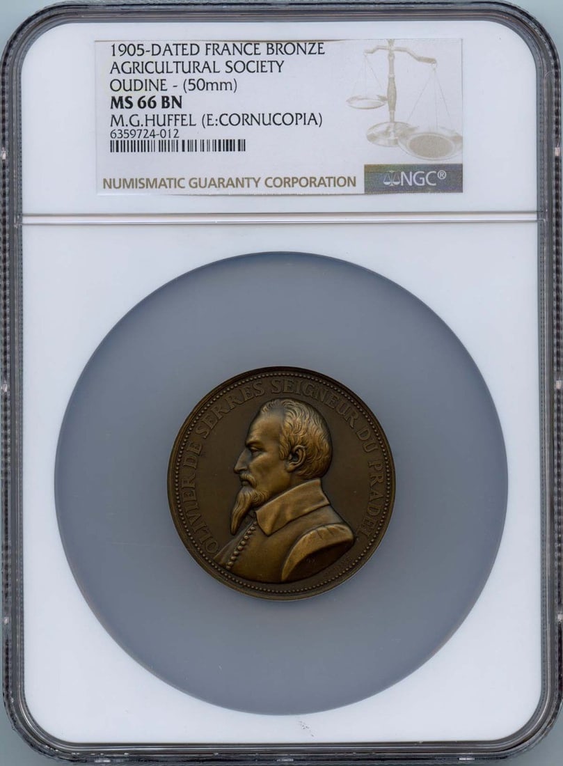 1905 France Bronze Medal Agricultural Society Oudine NGC MS66: 1905 France Bronze Medal Agricultural Society Oudine NGC MS66 This exquisite bronze medal, issued in 1905, celebrates the Agricultural Society of Oudine and showcases exceptional craftsmanship. Graded