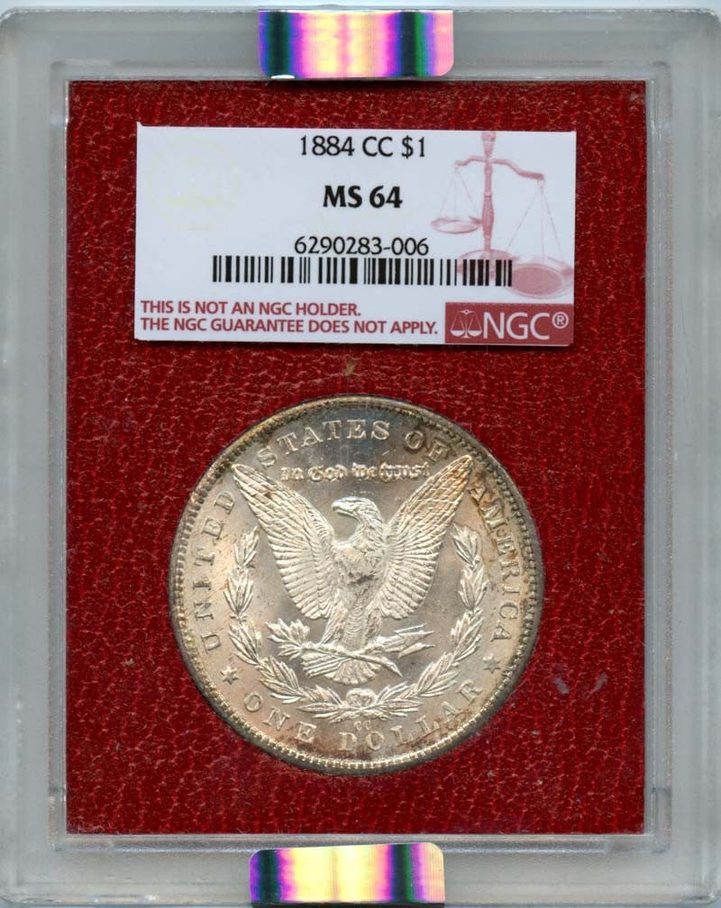 1884-CC Morgan Dollar NGC MS64 Uncirculated Coin: 1884-CC Morgan Dollar NGC MS64 Uncirculated Coin This stunning 1884-CC Morgan Dollar is graded MS64 by NGC, certifying its uncirculated condition. Minted in Carson City, this coin showcases the iconic