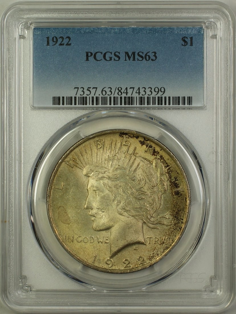 1922 Silver Peace Dollar Coin PCGS MS63 Toned Philadelphia: 1922 Silver Peace Dollar Coin PCGS MS63 Toned Philadelphia This 1922 Silver Peace Dollar coin is a remarkable piece of numismatic history. Graded MS 63 by PCGS, this uncirculated coin showcases a stun