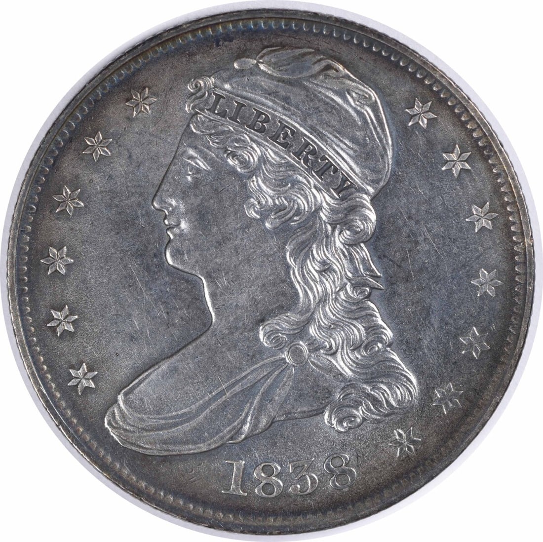 1838 Bust Silver Half Dollar AU Slider Reeded Edge 50C: 1838 Bust Silver Half Dollar AU Slider Reeded Edge 50C This 1838 Bust Silver Half Dollar features a reeded edge and showcases the exquisite design by Christian Gobrecht. Struck at the Philadelphia min