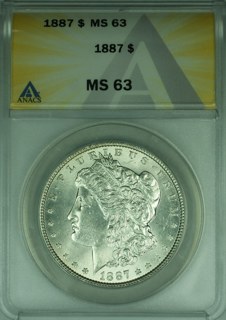 1887 Morgan Silver Dollar $1 ANACS MS63 Uncirculated Coin: 1887 Morgan Silver Dollar $1 ANACS MS63 Uncirculated Coin This 1887 Morgan Silver Dollar is a remarkable piece of numismatic history. Struck in Philadelphia, this coin features a composition of 90% si