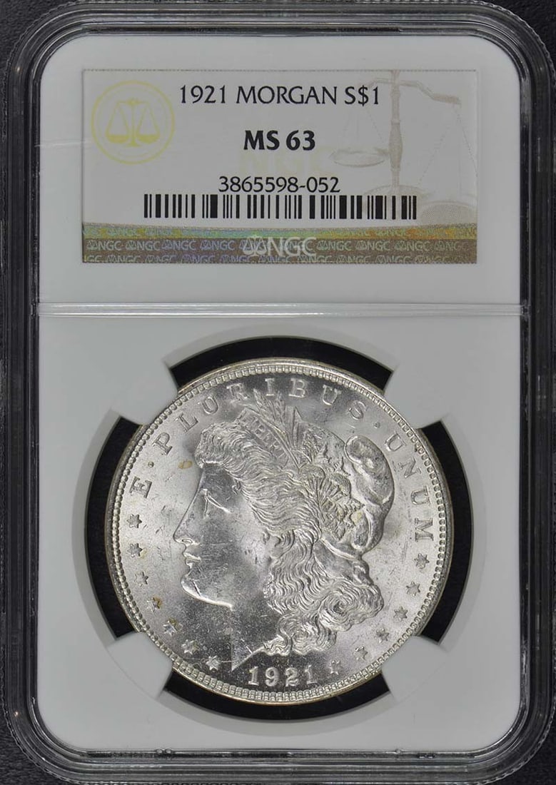 1921 NGC Certified Morgan Dollar MS63 Philadelphia Coin: 1921 NGC Certified Morgan Dollar MS63 Philadelphia Coin This 1921 Morgan Dollar is a classic piece of American numismatics, certified by NGC with a grade of MS63, indicating it is in uncirculated cond