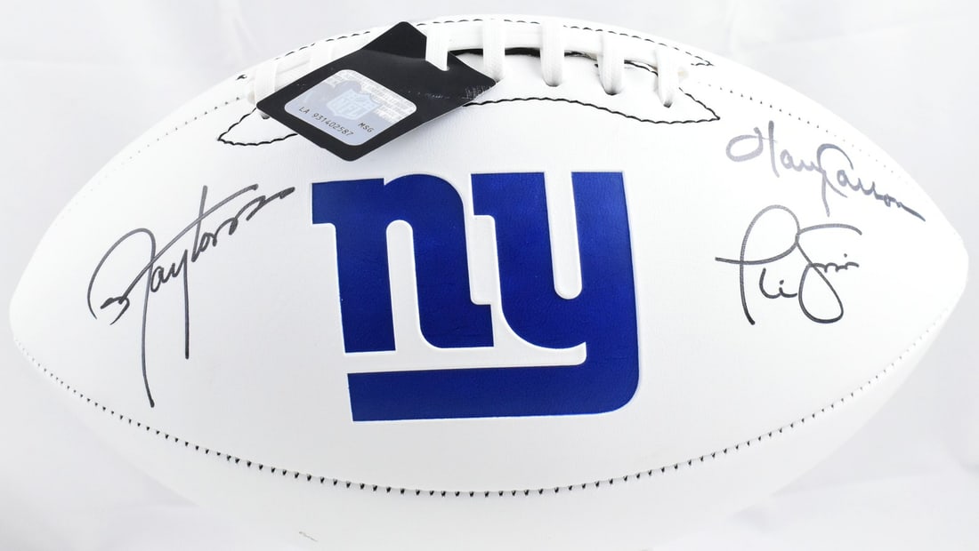 New York Giants Autographed Football by Taylor Simms Carson Beckett Holo: New York Giants Autographed Football by Taylor Simms Carson Beckett Holo This autographed New York Giants logo football features signatures from three legendary players: Lawrence Taylor, Phil Simms, a