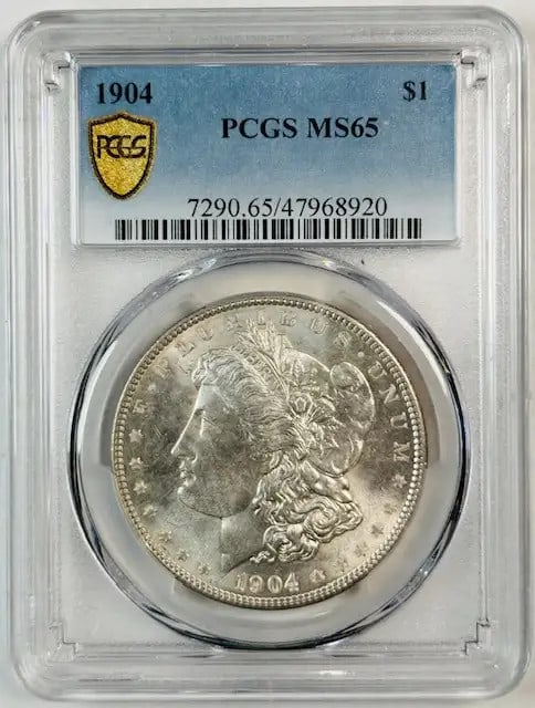 PCGS MS65 1904 Philadelphia Morgan Dollar Silver Uncirculated Coin: PCGS MS65 1904 Philadelphia Morgan Dollar Silver Uncirculated Coin This 1904 Morgan Silver Dollar has been professionally graded as MS-65 by PCGS. Minted in Philadelphia, it is composed of silver and