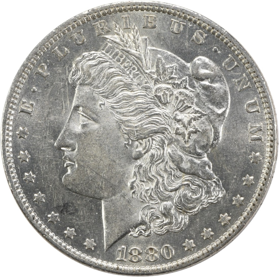 AU Grade 1880 New Orleans Morgan Dollar 90 Percent Silver Uncertified Coin: AU Grade 1880 New Orleans Morgan Dollar 90 Percent Silver Uncertified Coin This 1880-O Morgan Silver Dollar features a composition of 90% silver and 10% copper, minted in New Orleans. The coin was des