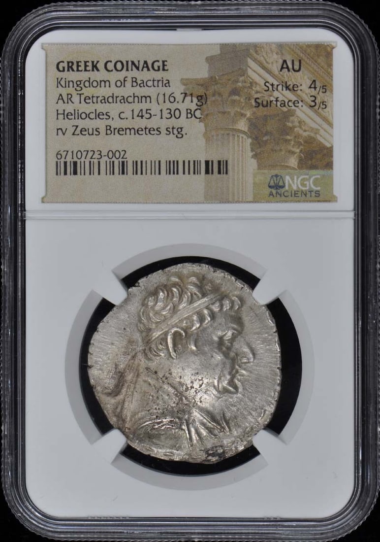 Kingdom of Bactria Heliocles Greek AR Tetradrachm NGC AU50 Coin: Kingdom of Bactria Heliocles Greek AR Tetradrachm NGC AU50 Coin This ancient Greek tetradrachm from the Kingdom of Bactria features Heliocles and is certified by NGC with an AU50 grade. A remarkable p