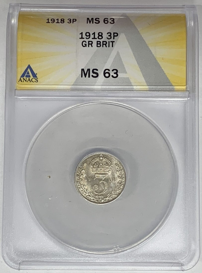 1918 Great Britain 3 Pence Silver Coin ANACS MS 63: 1918 Great Britain 3 Pence Silver Coin ANACS MS 63 This 1918 Great Britain 3 Pence Coin is a remarkable collectible featuring a denomination of 3 pence, minted from silver. Graded as MS 63 by ANACS, t
