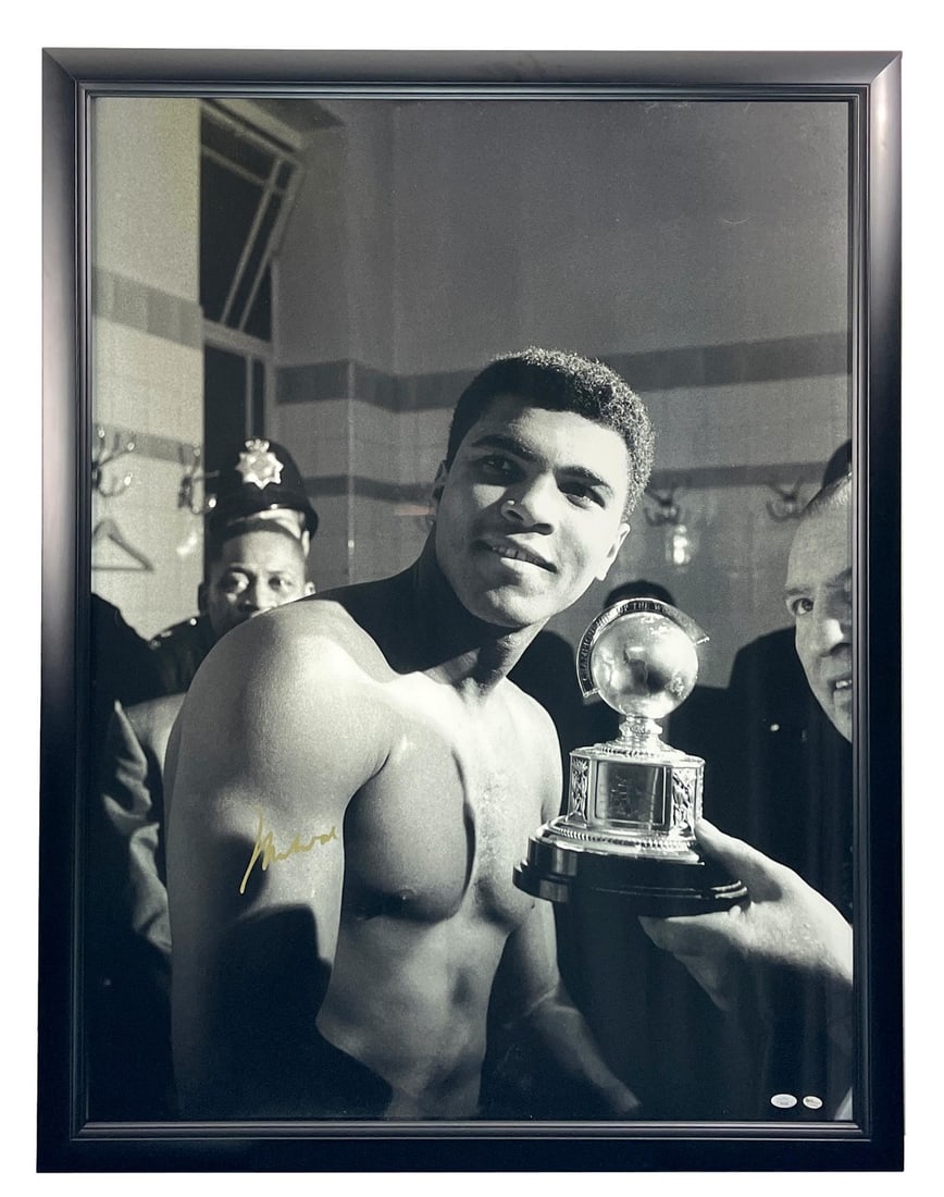 Framed 30x40 Black and White Muhammad Ali Photo Signed With JSA Letter: Framed 30x40 Black and White Muhammad Ali Photo Signed With JSA Letter This exceptional Muhammad Ali autographed photograph captures the boxing legend in a striking large-format black-and-white image,