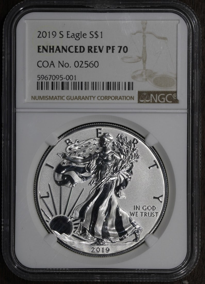 Enhanced Reverse Proof 2019-S Silver Eagle Dollar NGC PF70 Certified: Enhanced Reverse Proof 2019-S Silver Eagle Dollar NGC PF70 Certified This 2019-S Enhanced Reverse Proof American Silver Eagle $1 coin is struck in .999 fine silver by the U.S. Mint. It features a proo
