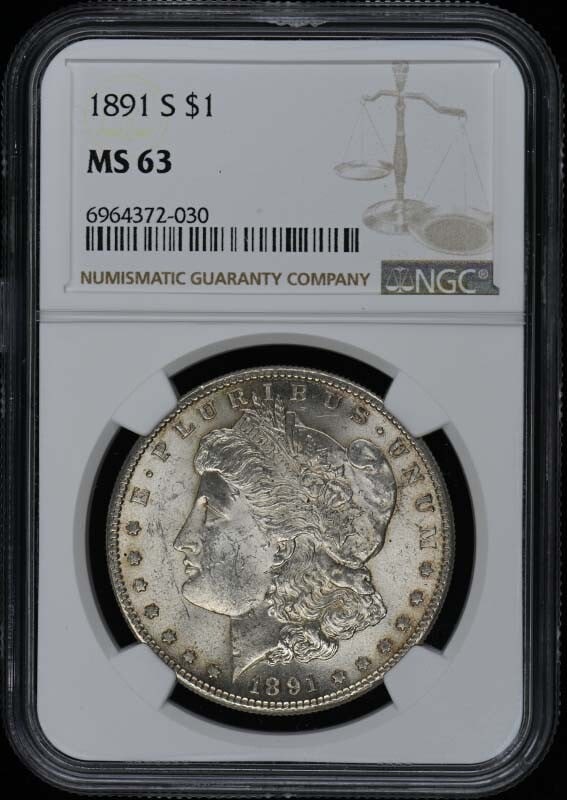 1891-S Morgan Dollar NGC MS63 Uncirculated San Francisco Mint: 1891-S Morgan Dollar NGC MS63 Uncirculated San Francisco Mint This 1891-S Morgan Dollar is a remarkable example of American numismatic history. Graded MS63 by NGC, this uncirculated coin showcases the
