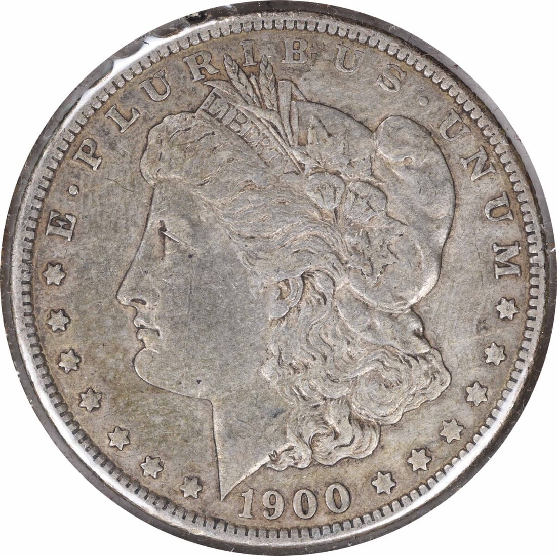 1900-O Morgan Silver Dollar 90% Silver Uncertified Coin: 1900-O Morgan Silver Dollar 90% Silver Uncertified Coin This 1900-O/CC Morgan Silver Dollar showcases the artistry of designer George T. Morgan. Struck at the New Orleans Mint, this coin is composed o