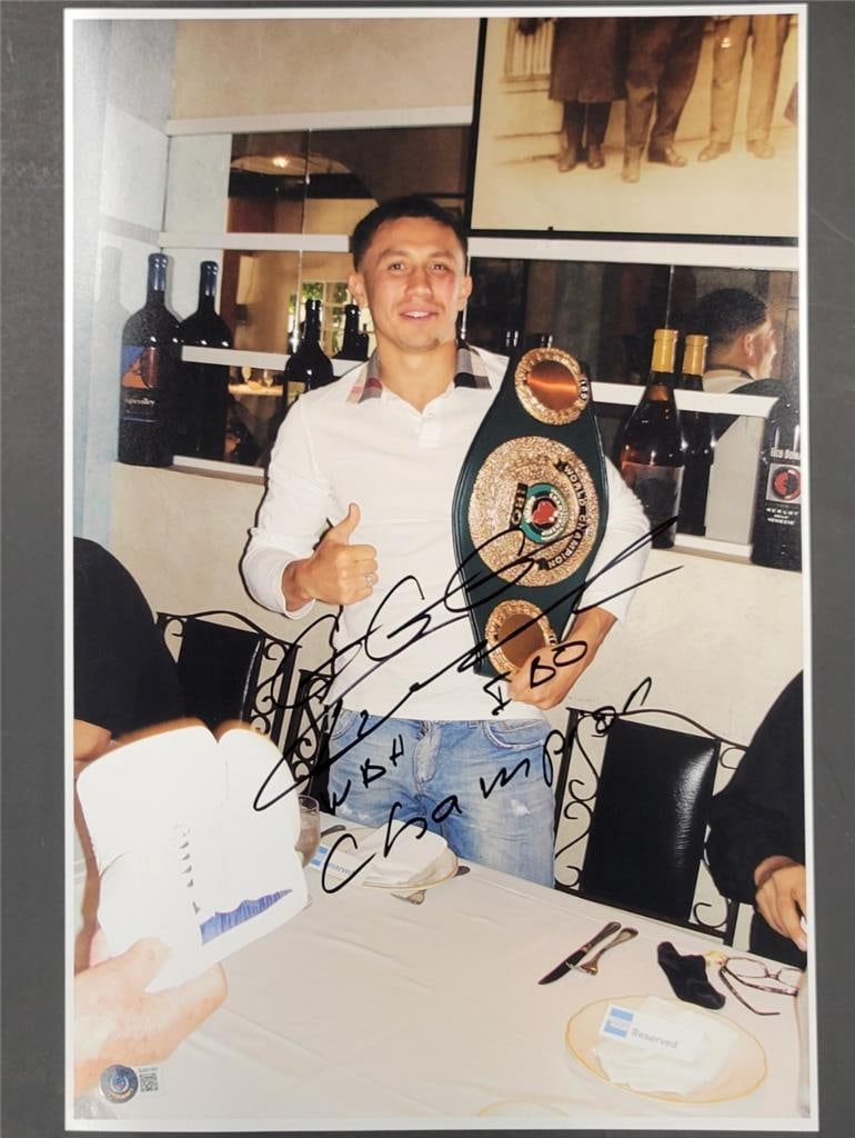 Gennady Golovkin Signed 12x18 Photo WBA IBO Champion Beckett BAS: Gennady Golovkin Signed 12x18 Photo WBA IBO Champion Beckett BAS This is an original 12x18 photo of Gennady Golovkin, also known as GGG, showcasing his titles as WBA and IBO Champion. The photograph i