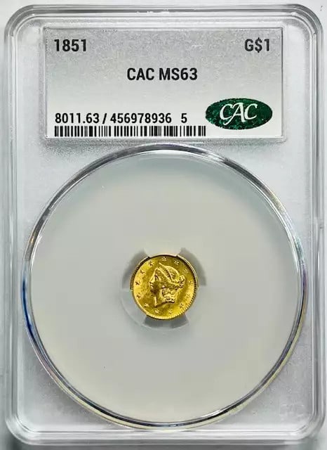 1851 Liberty Head Gold Dollar Graded CACG MS 63 CAC Certified: 1851 Liberty Head Gold Dollar Graded CACG MS 63 CAC Certified This 1851 Liberty Head Gold Dollar is certified by CAC and graded MS 63. The coin is composed of gold and originates from the USA. Its cer