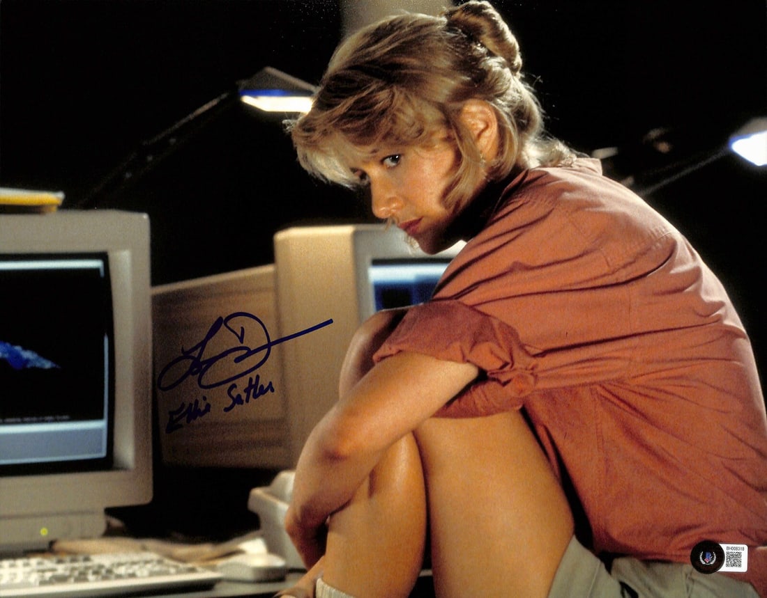 Laura Dern Signed 11x14 Jurassic Park Photo Beckett Certified: Laura Dern Signed 11x14 Jurassic Park Photo Beckett Certified This stunning 11x14 color photograph features Laura Dern as Ellie Sattler from the iconic film Jurassic Park. The photo is autographed in