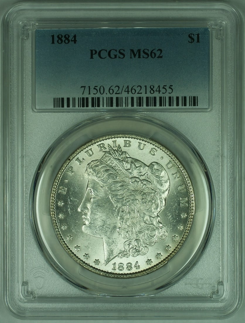 1884 Morgan Silver Dollar PCGS MS62 Uncirculated Silver Coin: 1884 Morgan Silver Dollar PCGS MS62 Uncirculated Silver Coin This 1884 Morgan Silver Dollar is a stunning example of American numismatic history. Graded as MS-62 by PCGS, this uncirculated coin featur