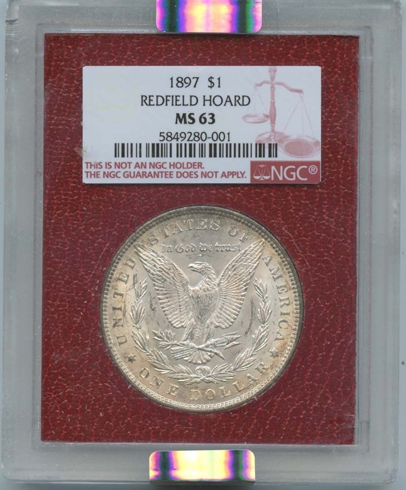 1897 Morgan Dollar NGC MS63 Redfield Hoard Uncirculated: 1897 Morgan Dollar NGC MS63 Redfield Hoard Uncirculated This 1897 Morgan Dollar is a remarkable piece from the Redfield Hoard, certified by NGC with a grade of MS63, indicating its uncirculated condit