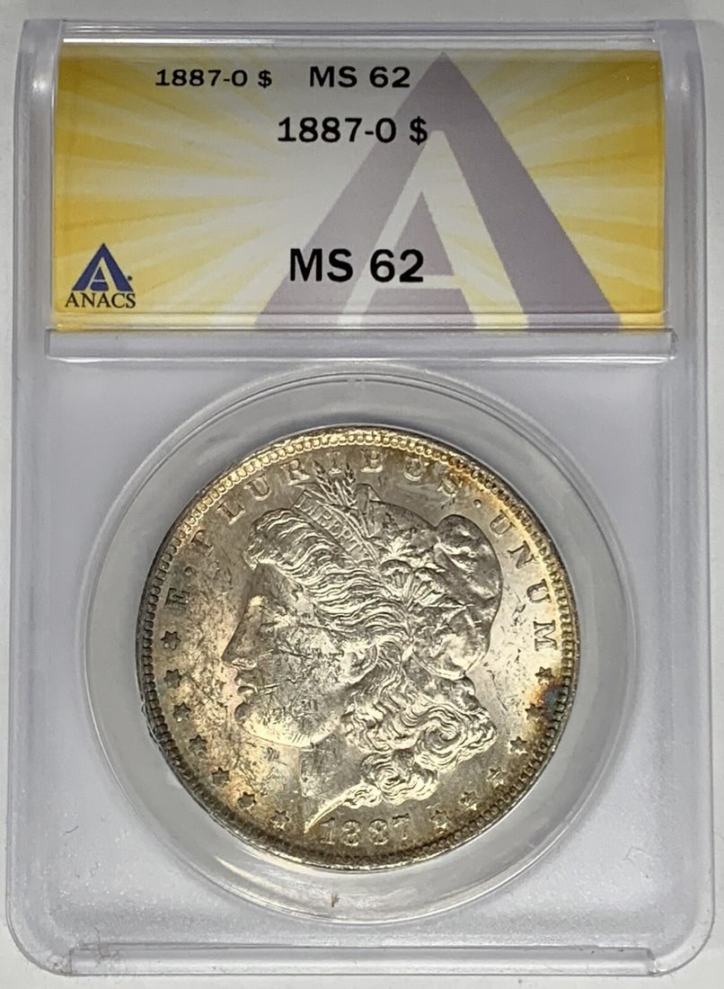 1887-O Morgan Silver Dollar ANACS MS 62 Uncirculated Silver Coin: 1887-O Morgan Silver Dollar ANACS MS 62 Uncirculated Silver Coin This 1887-O Morgan Silver Dollar is a stunning example of American coinage, certified by ANACS with a grade of MS 62. Struck in silver