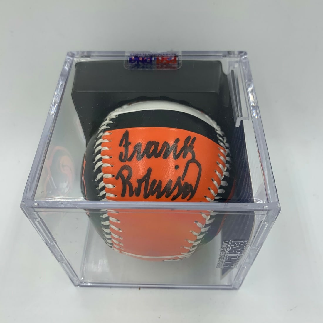 Frank Robinson Autographed Orioles Baseball PSA DNA Gem Mint 10: Frank Robinson Autographed Orioles Baseball PSA DNA Gem Mint 10 This is an original baseball signed by Frank Robinson, a legendary player of the Baltimore Orioles. The ball has been authenticated by P