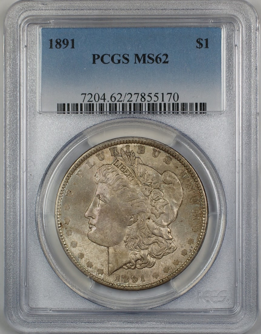 1891 Morgan Silver Dollar Coin PCGS MS62 Uncirculated Toned: 1891 Morgan Silver Dollar Coin PCGS MS62 Uncirculated Toned This 1891 Morgan Silver Dollar is a stunning example of American coinage, certified by PCGS with a grade of MS 62. Struck in silver at the P