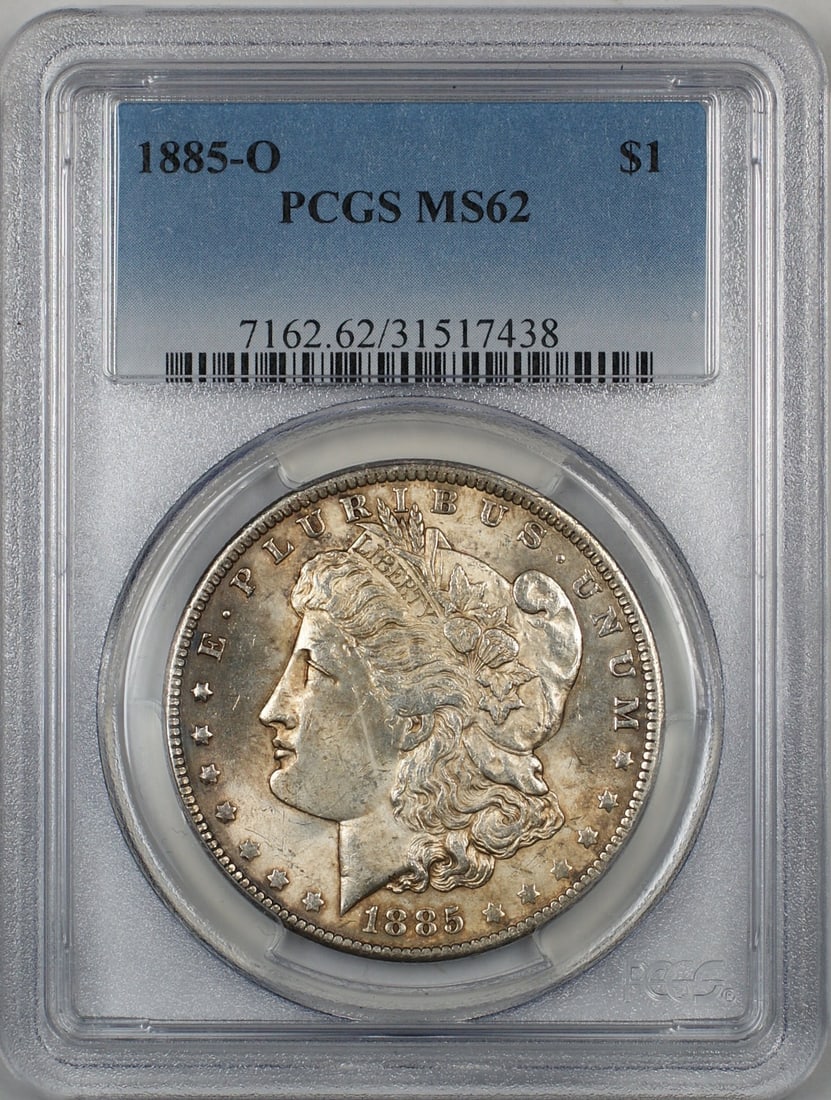 1885-O Morgan Silver Dollar PCGS MS62 Toned Uncirculated Coin: 1885-O Morgan Silver Dollar PCGS MS62 Toned Uncirculated Coin This 1885-O Morgan Silver Dollar is a remarkable piece certified by PCGS with a grade of MS 62, indicating its uncirculated condition. Min