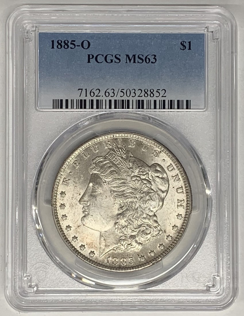 1885-O Morgan Silver Dollar Coin PCGS MS 63 Uncirculated: 1885-O Morgan Silver Dollar Coin PCGS MS 63 Uncirculated This 1885-O Morgan Silver Dollar Coin is a stunning addition for collectors, featuring an uncirculated quality graded at MS 63 by PCGS. Struck