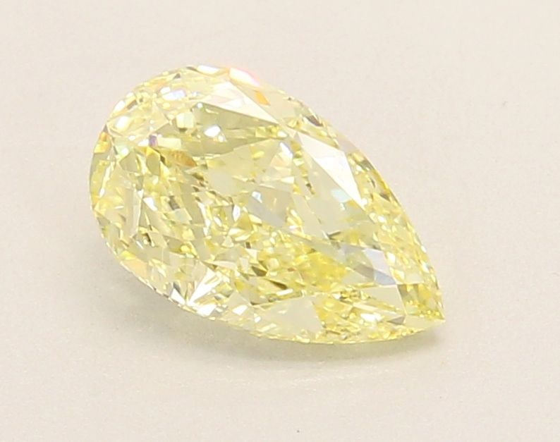 Loose Diamond - PEAR 1.24ct Fancy Yellow VVS2: Loose Diamond - PEAR 1.24ct Fancy Yellow VVS2 Source: This is a real non-mined Diamond that has been grown in a lab Shape: PEAR Carats: 1.24 Color: Fancy Yellow Certification: IGI Video: