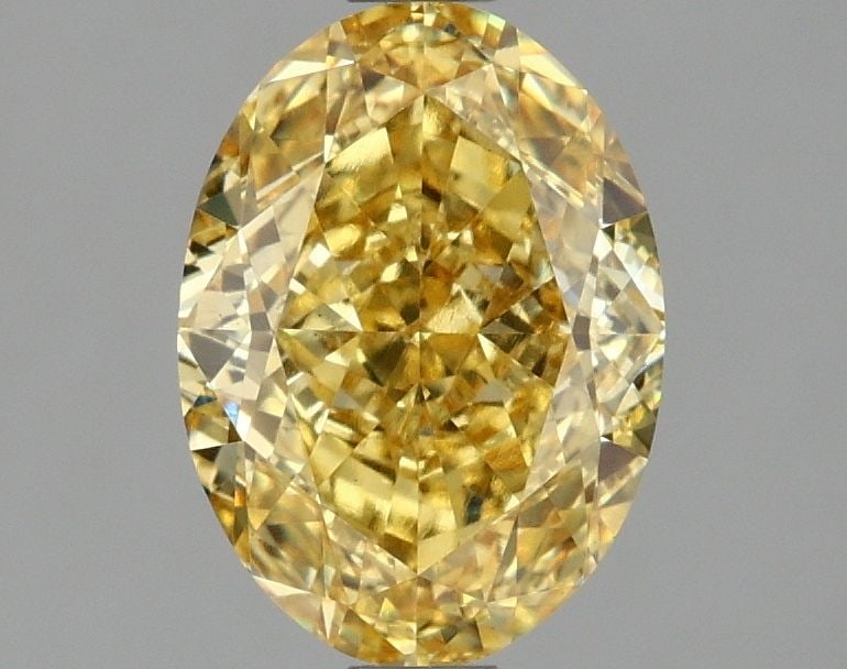 Loose Diamond - OVAL 2.1ct Fancy Vivid Yellow VS1: Loose Diamond - OVAL 2.1ct Fancy Vivid Yellow VS1 Source: This is a real non-mined Diamond that has been grown in a lab Shape: OVAL Carats: 2.1 Color: Fancy Vivid Yellow Certification: IGI Video: