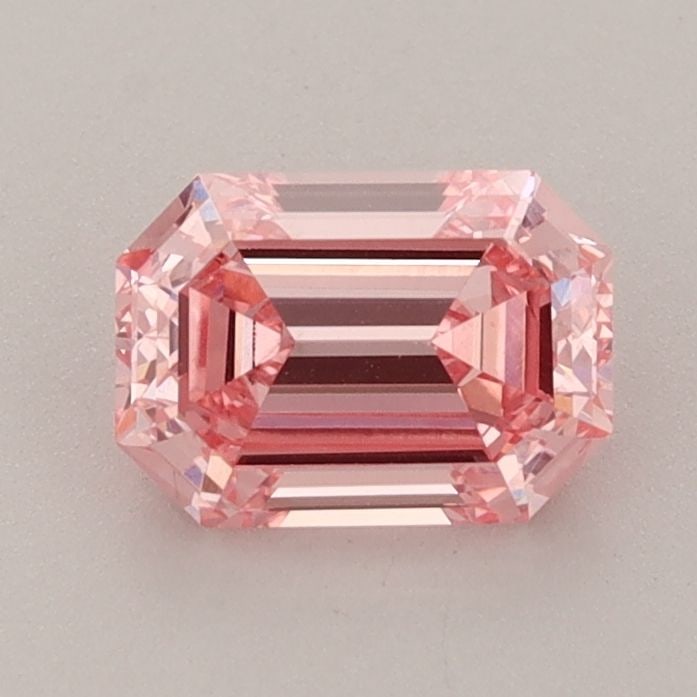 Loose Diamond - EMERALD 0.99ct Fancy Vivid Pink VS2: Loose Diamond - EMERALD 0.99ct Fancy Vivid Pink VS2 Source: This is a real non-mined Diamond that has been grown in a lab Shape: EMERALD Carats: 0.99 Color: Fancy Vivid Pink Certification: IGI Video: