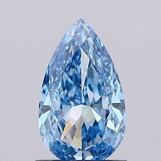 Loose Diamond - PEAR 1.04ct Fancy Vivid Blue VS2: Loose Diamond - PEAR 1.04ct Fancy Vivid Blue VS2 Source: This is a real non-mined Diamond that has been grown in a lab Shape: PEAR Carats: 1.04 Color: Fancy Vivid Blue Certification: IGI Video:
